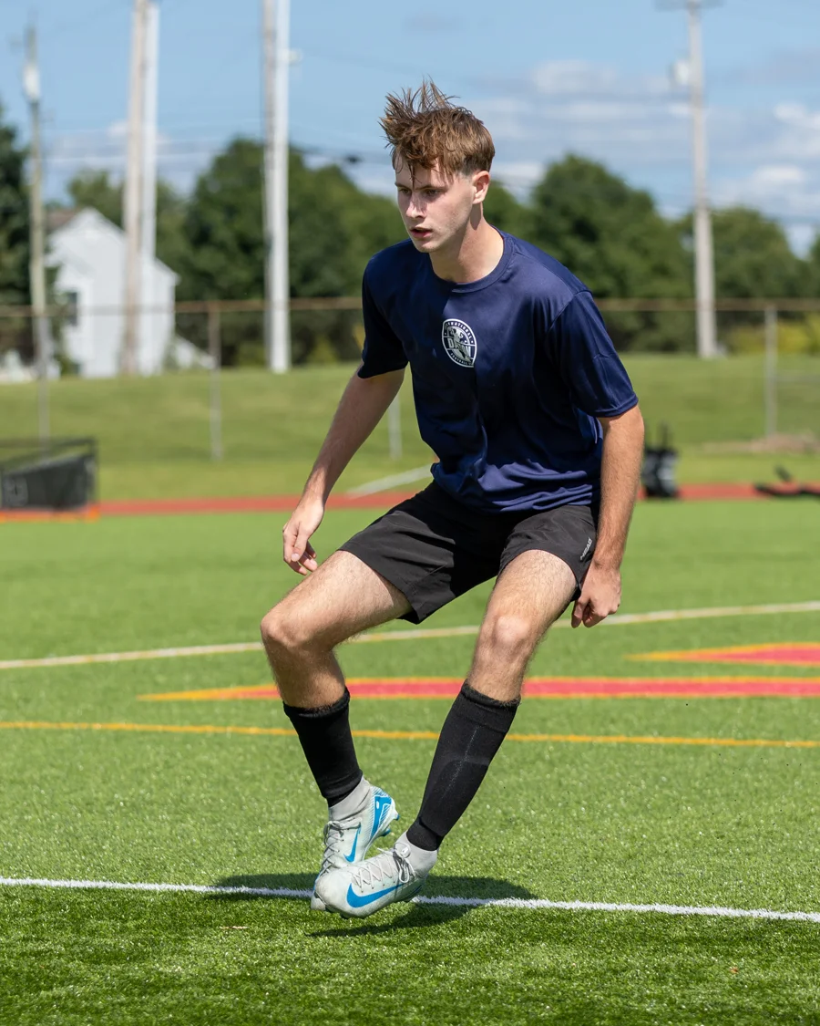 An IFC Dayton player preparing to defend on the soccer field