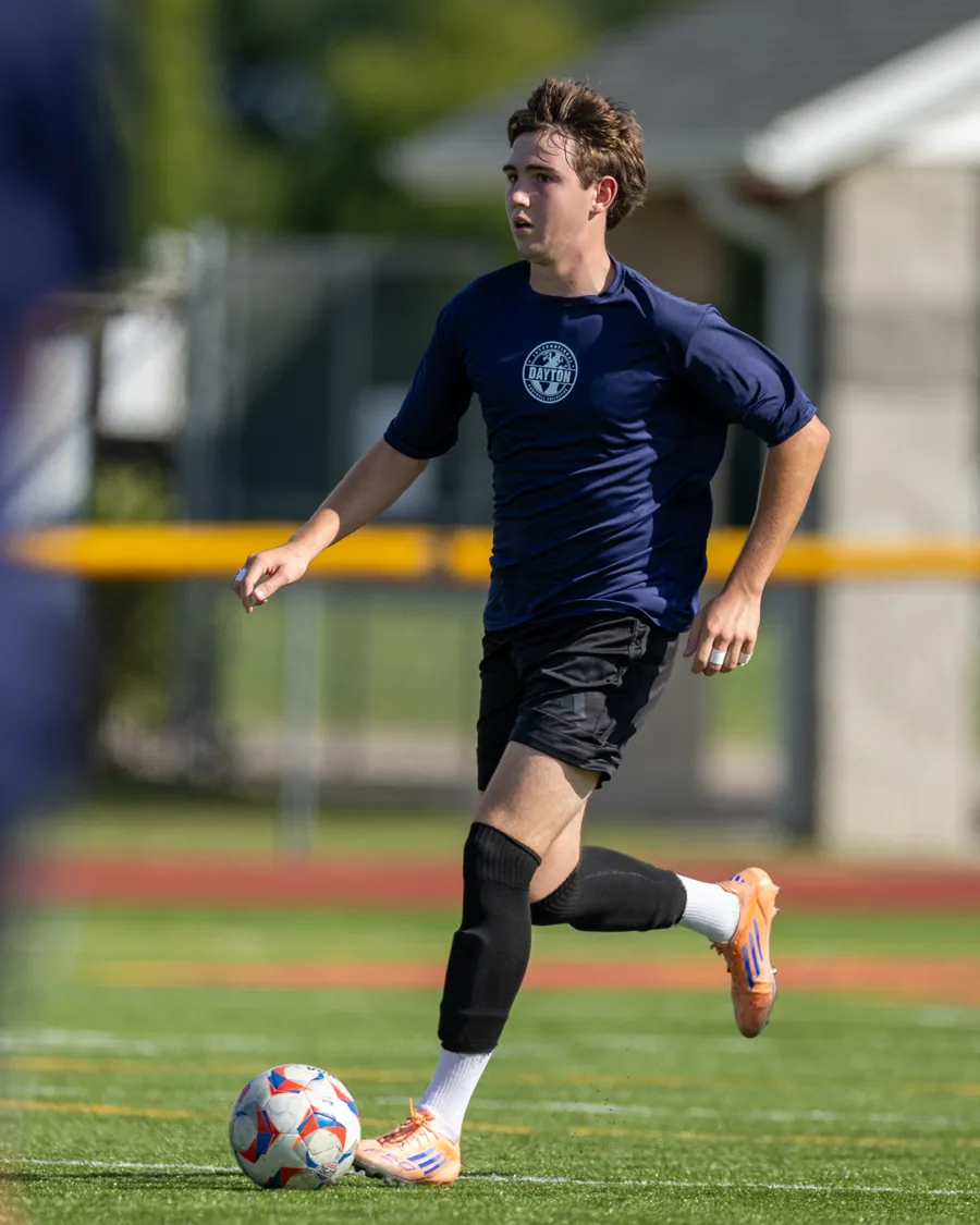 An IFC Dayton player controlling the ball during a match