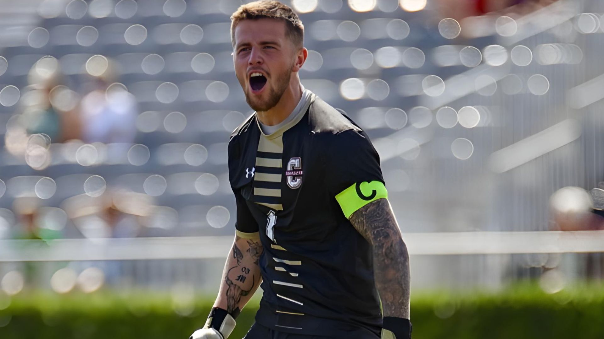 College footballer competing in a U.S. stadium